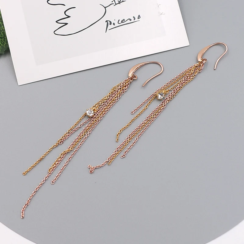 Cadenas de borla con aretes de diamantes